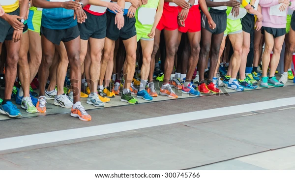 athletes waiting marathon start line 600w 300745766